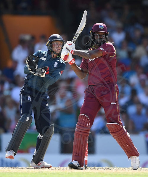Chris Gayle smashes another six during his 135.