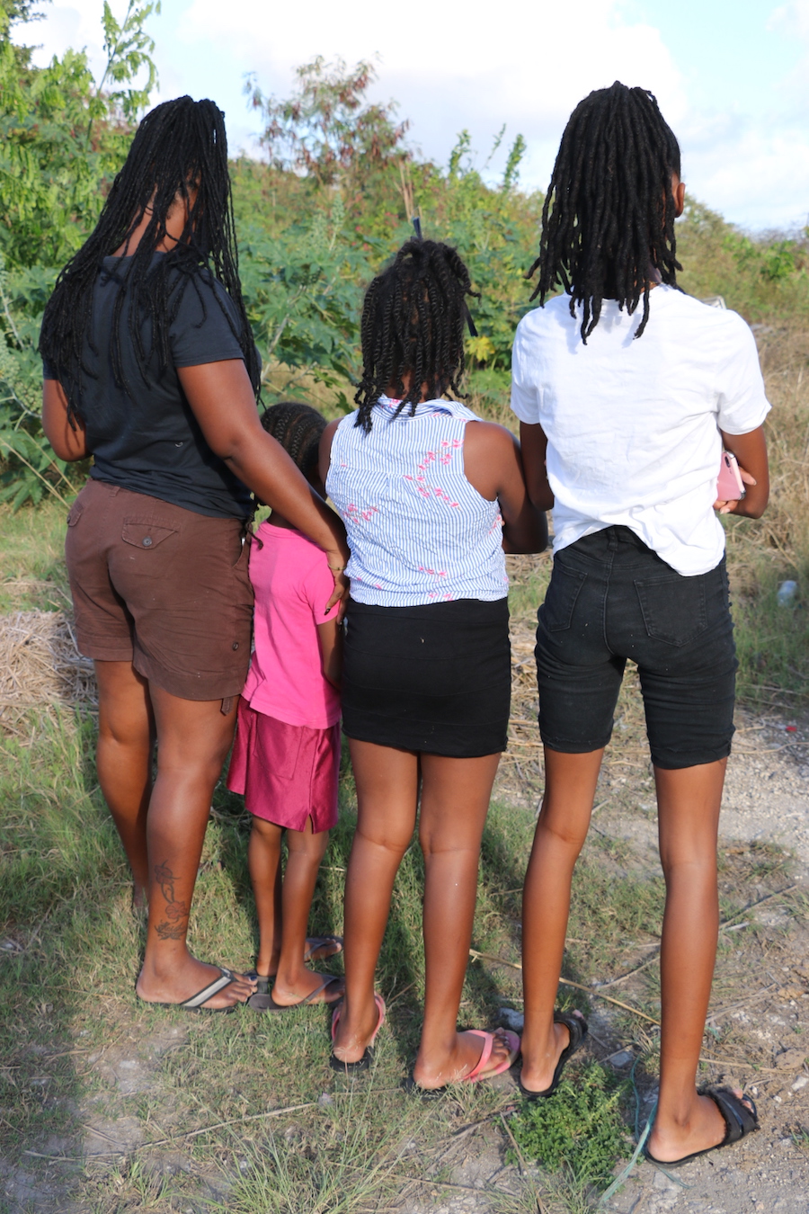 Keisha Bispham (left) and three of her four children want answers on the wherabouts of Marlon Smith.