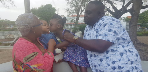 Ishaka McNeil (right), his partner Tamika Newton, their one-year-old son Alyrikos McNeil (second from left) and three-year-old adopted daughter Jelissa Eastmond.