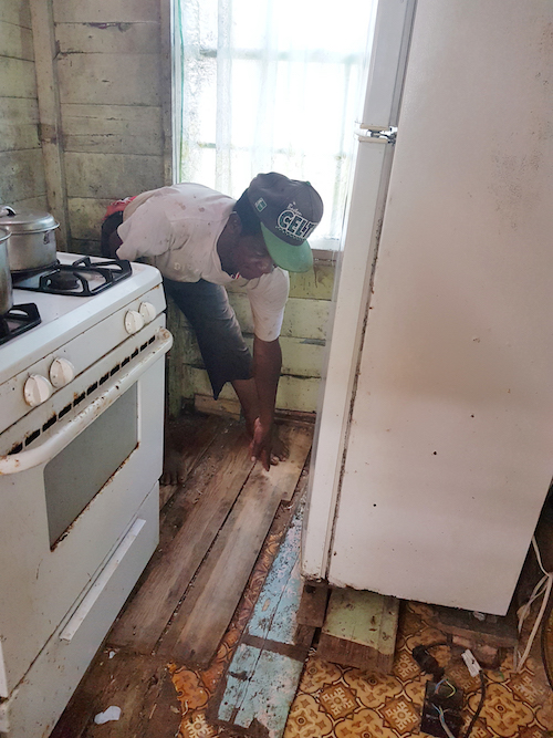 The flooring in Percy Howell’s house is rotted and in dire need of repair.