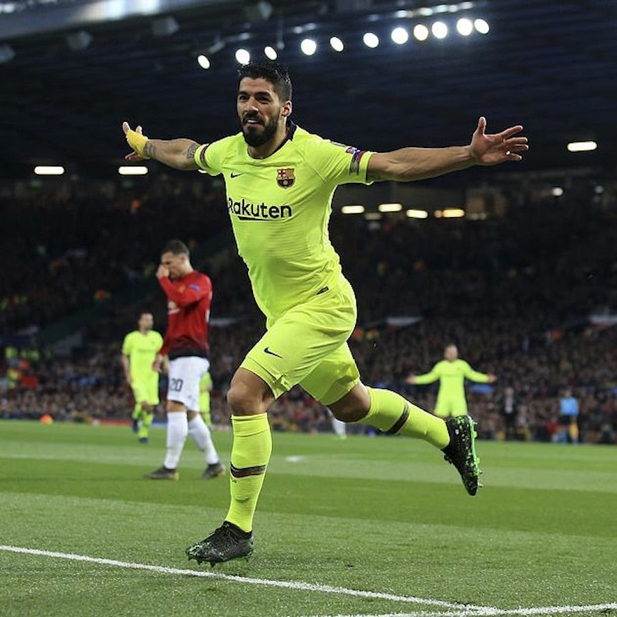 Luis Suarez celebrates after his header was deflected into the net by United’s Luke Shaw. (DailyMail)