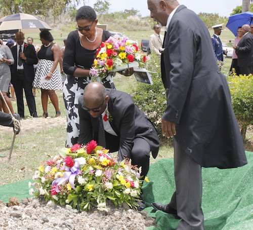 The children of Major Sam Headley, including his son Dr Sam Headley (centre) and daughter Pamela Headley (left) laying wreaths at their father’s gravesite.