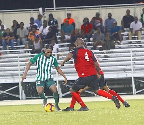 Antone Greaves of Weymouth Wales (left) scored twice against Brittons Hill United.