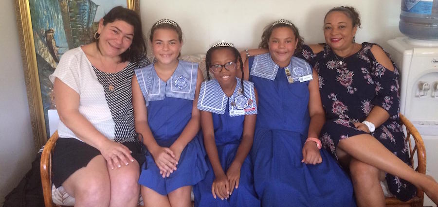 From left, Principal of Wills Primary School Nicole Wills, Victoria Georges, Top Performer in English Language Nala Maughn, Top student in Mathematics Natasha Georges and Co-Principal Julia Franklin. All three students will be attending Queen’s College in September.