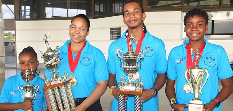 Age group gold medallists (from left) Under-11 girls champion Phoebe Gittens, Under-19s queen and king Meagan Best and Khamal Cumberbatch and Under-13 star Ebony Atherley. (Picture by Morissa Lindsay)