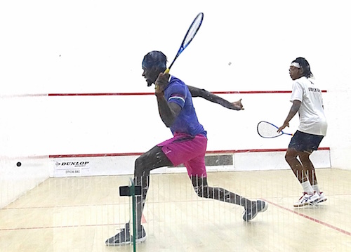 National men’s champion Shawn Simpson (left) was victorious and extended his record to 11 against Pan American gold medallist Khamal Cumberbatch.
