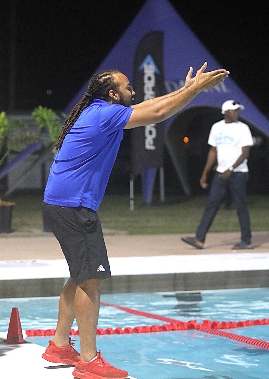 Water polo coach Ryan Forde urging on his charges during the Central American and Caribbean Swimming Federation Championship. (Picture by Morissa Lindsay)