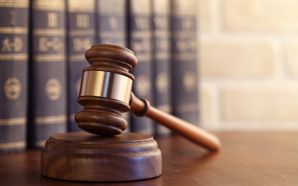 Used car dealer to return to court in theft, money laundering case