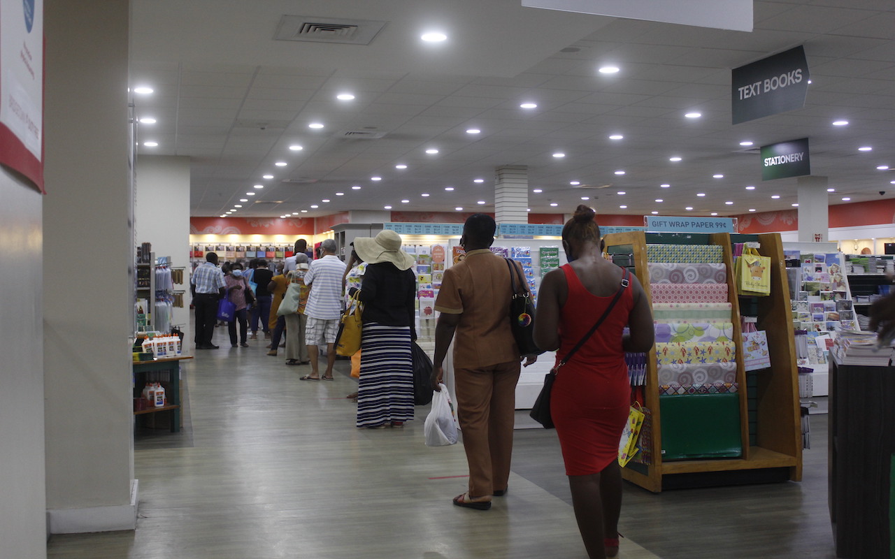 Shopping rush amid COVID surge as merchants stress protocols, nix