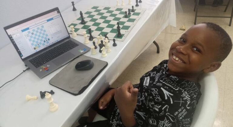 Clarke, Farley claim chess titles