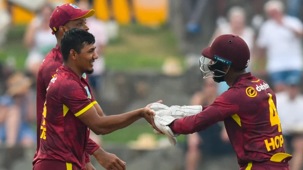 Motie and Lewis help craft an 8-wicket victory in rain-affected opener