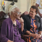 Hardworking centenarian celebrates with loved ones