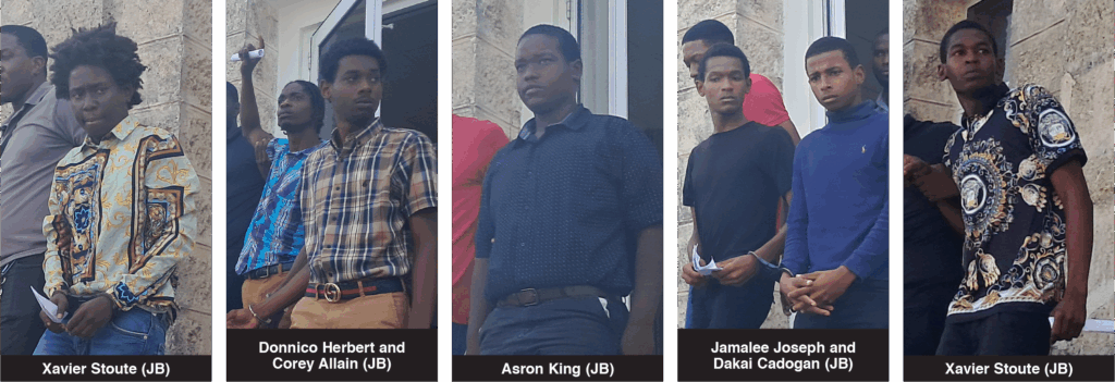 Seven remanded as prosecutor opposes bail