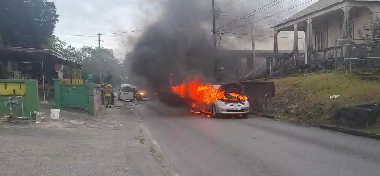Taxi goes up in flames
