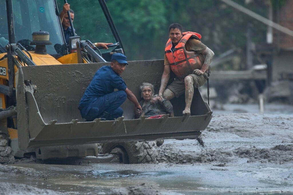 At least 98 dead, hundreds missing in Nepal, China