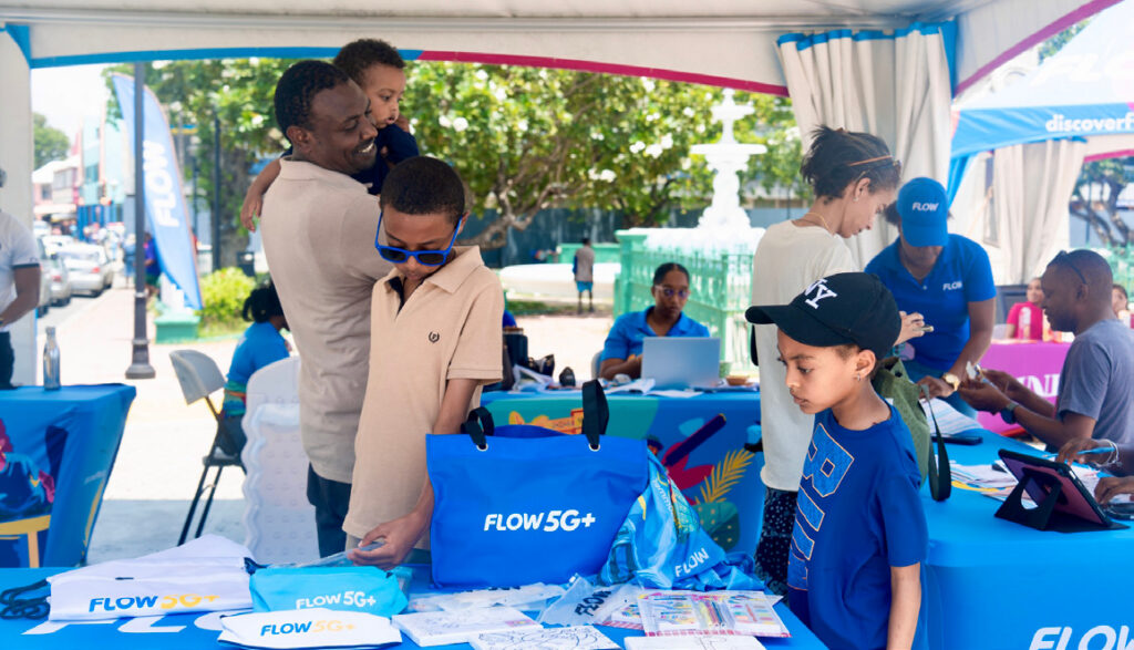 Flow back-to-school giveback helps scores of students